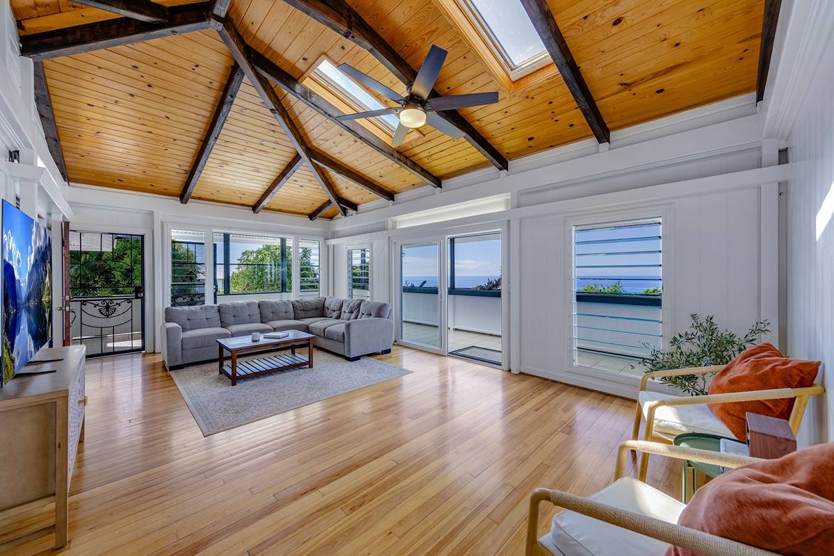 a outdoor space with patio lots of furniture and wooden floor