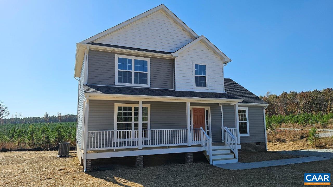 a front view of a house with a porch