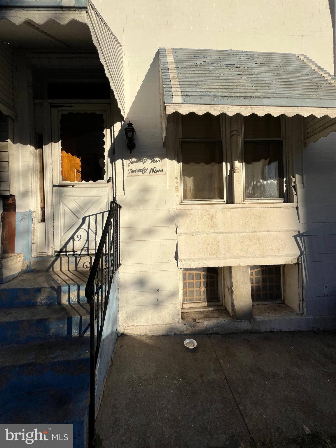 a view of a balcony with two chairs