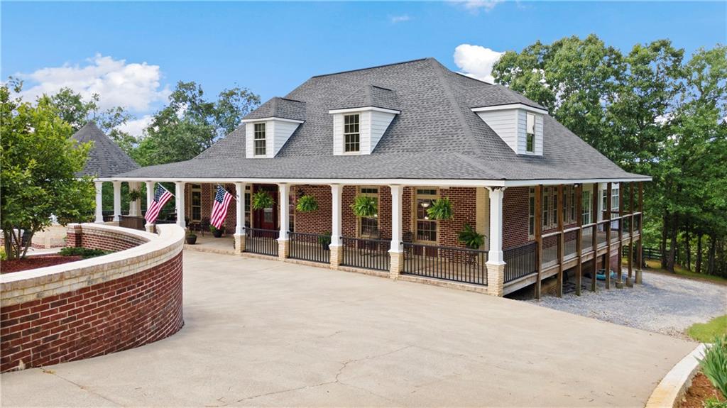 a front view of a house with a balcony