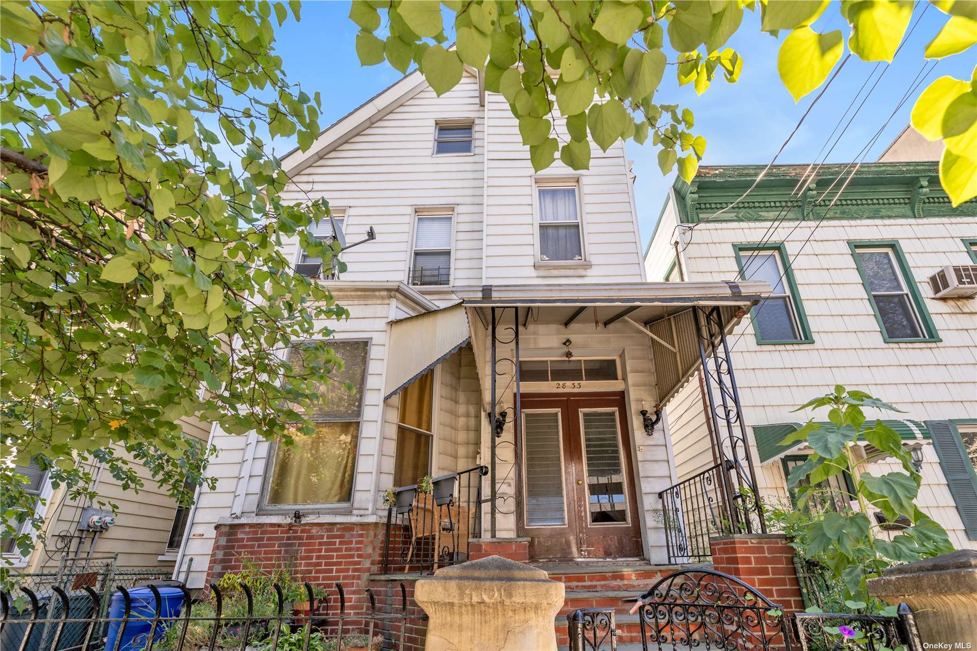 a view of front of house with a street