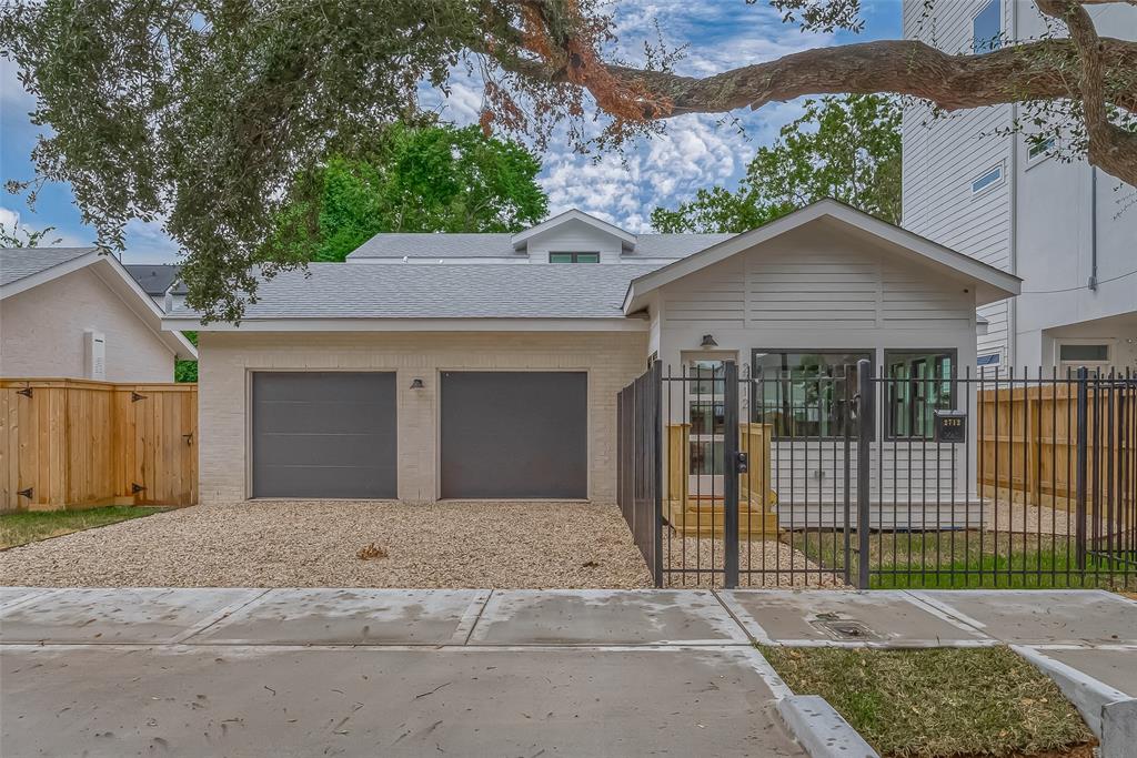 a front view of a house with a garage