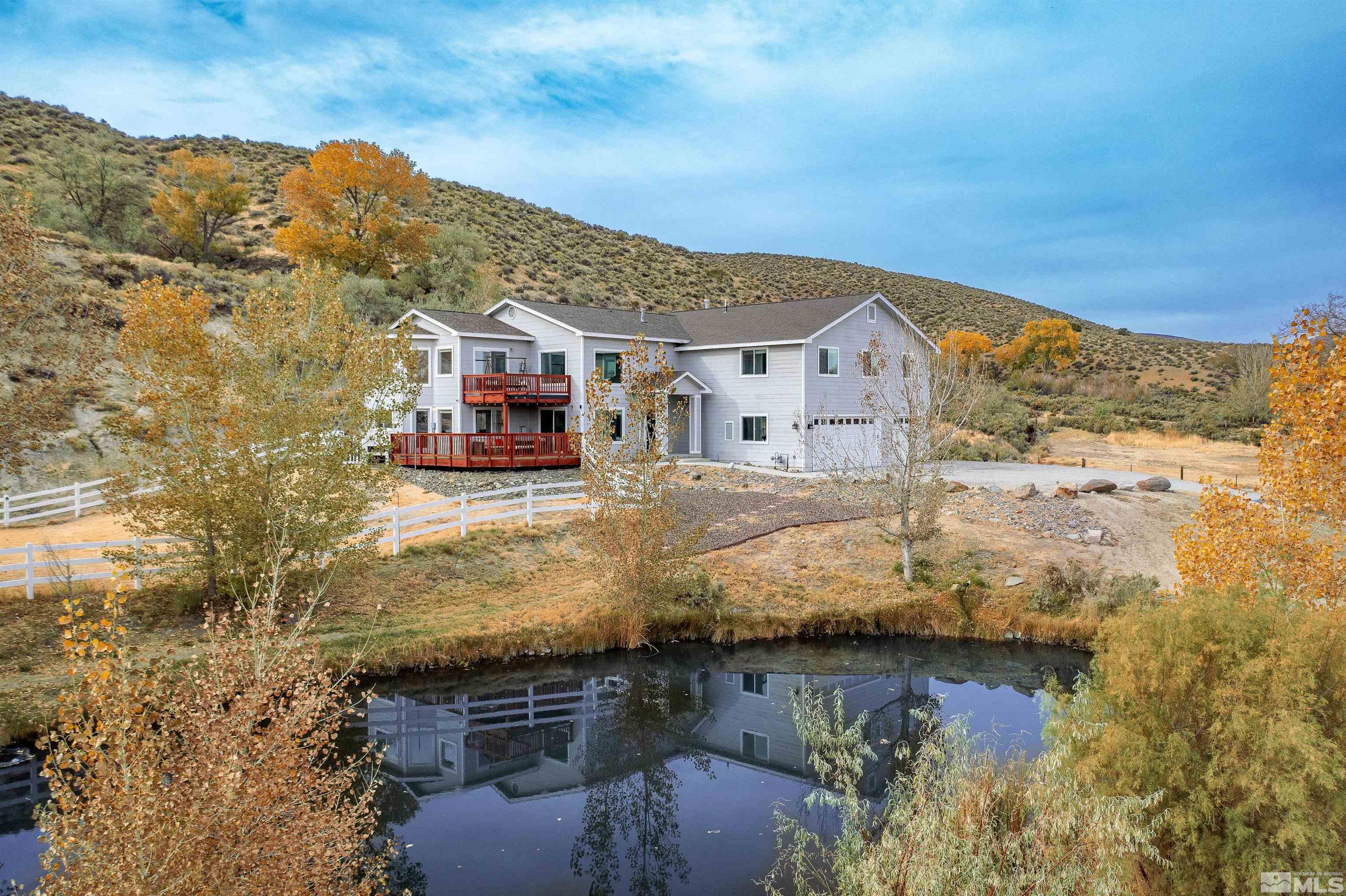 a view of a house with a lake view