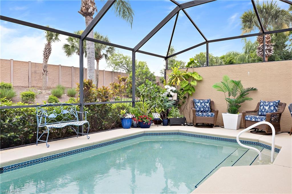 a view of a swimming pool with a patio