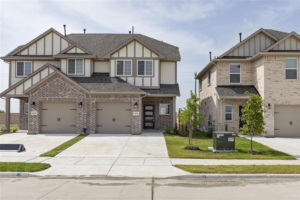 front view of a house with a yard