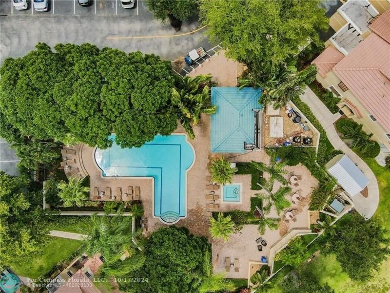 an aerial view of a house with outdoor space