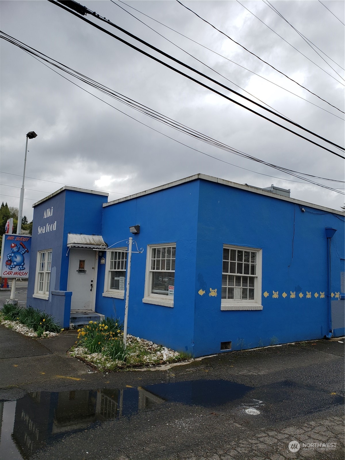 a view of a building with a street