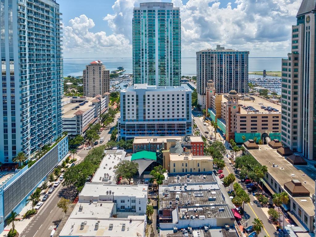 a view of city with tall buildings