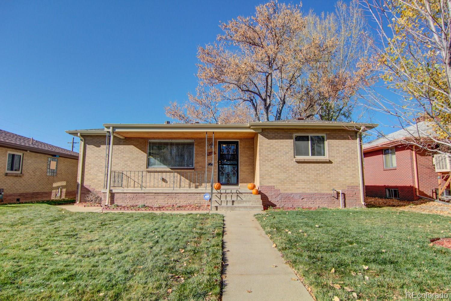 front view of a house with a yard