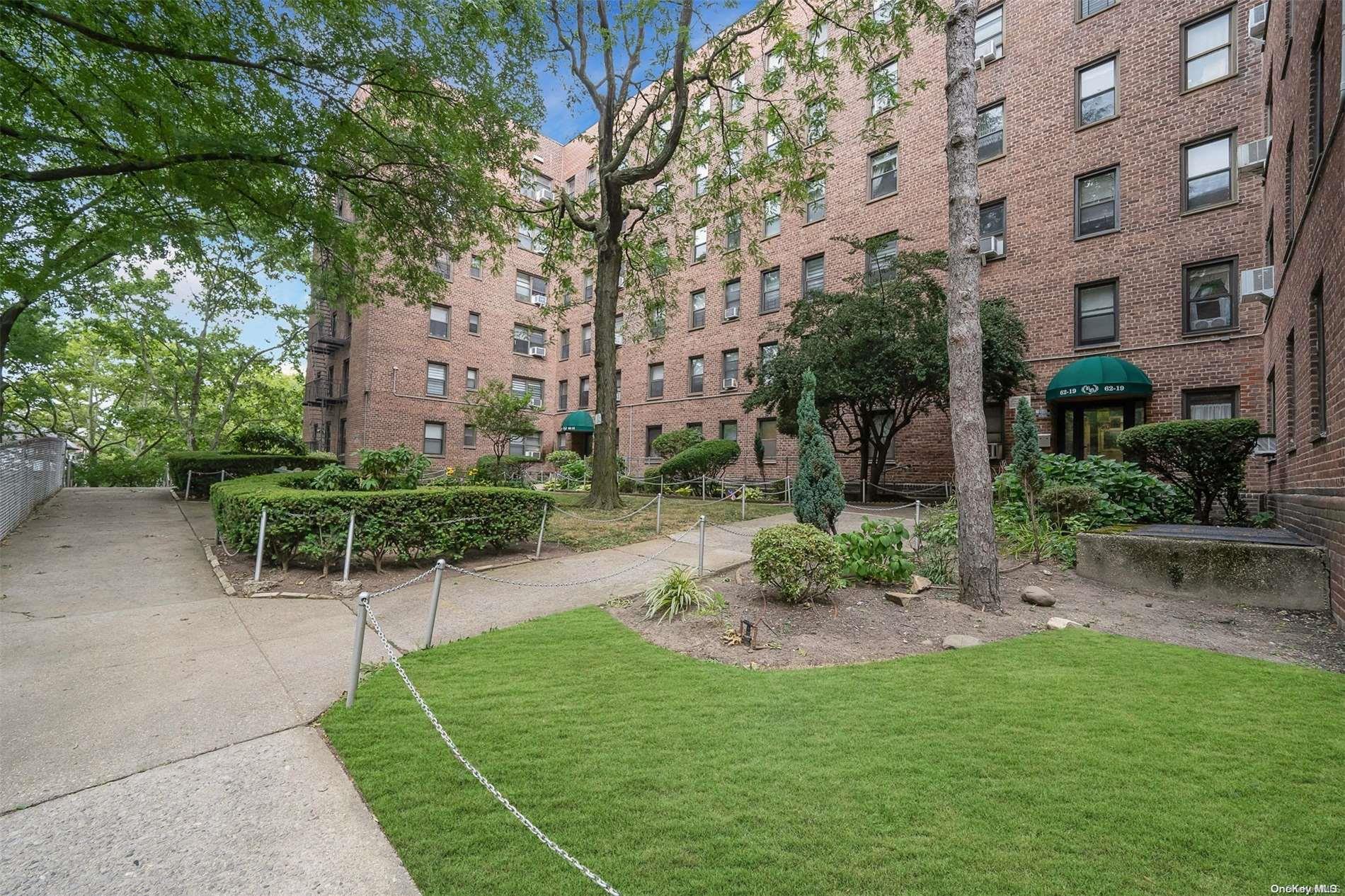 a view of backyard with patio and outdoor seating