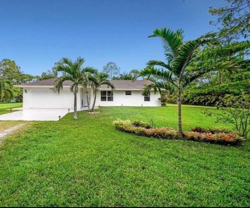 a house with a garden in front of it