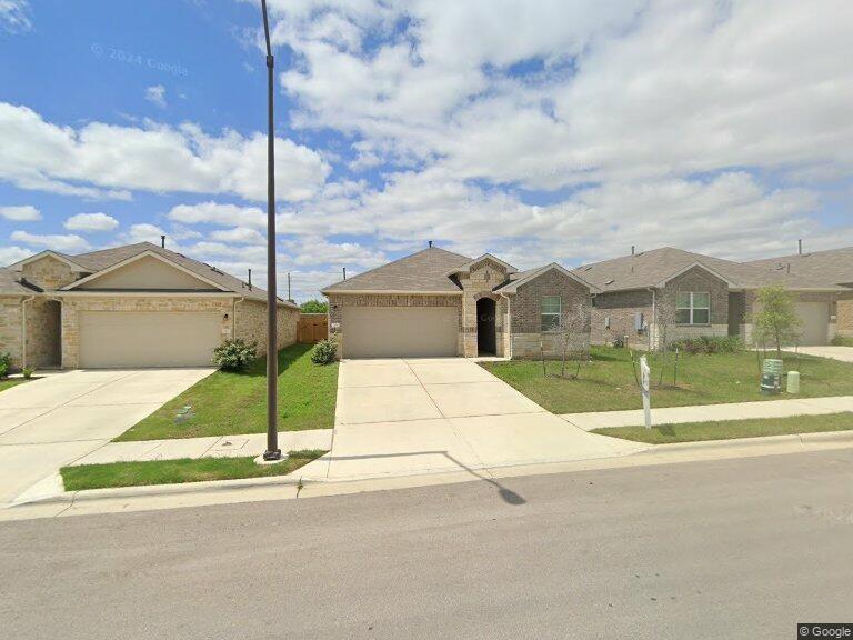 a house view with a outdoor space