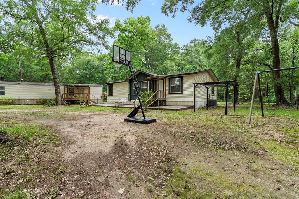 a house view with a backyard space