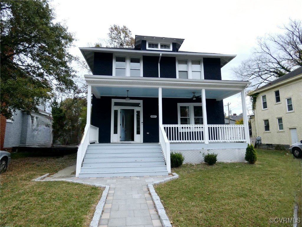 View of front of property with covered porch, a fr