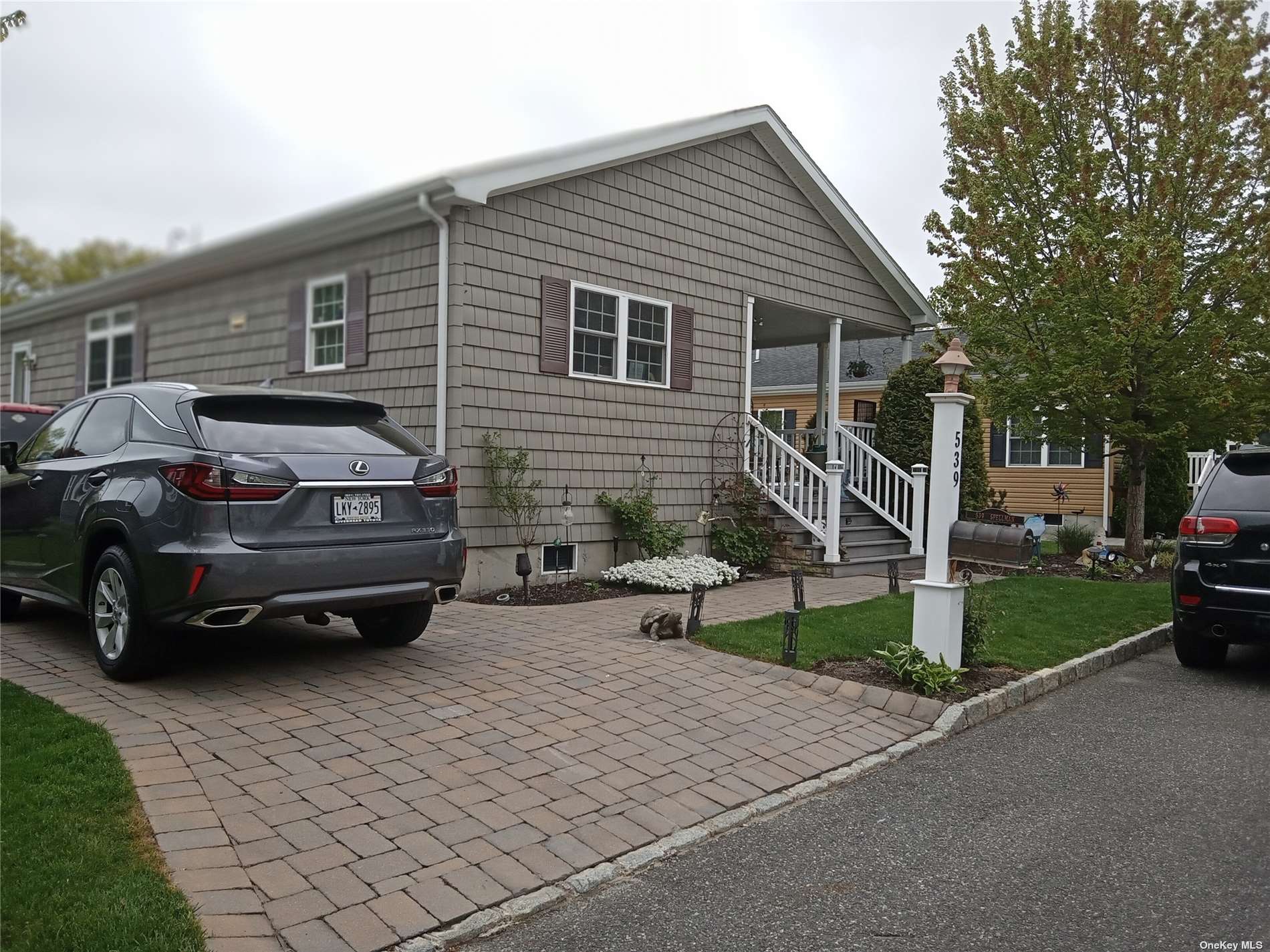 a view of a car in front of house