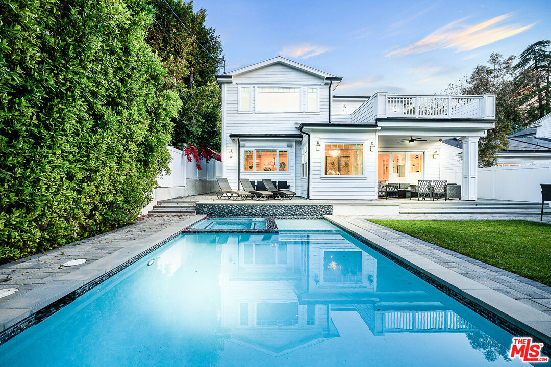 a view of a house with a swimming pool