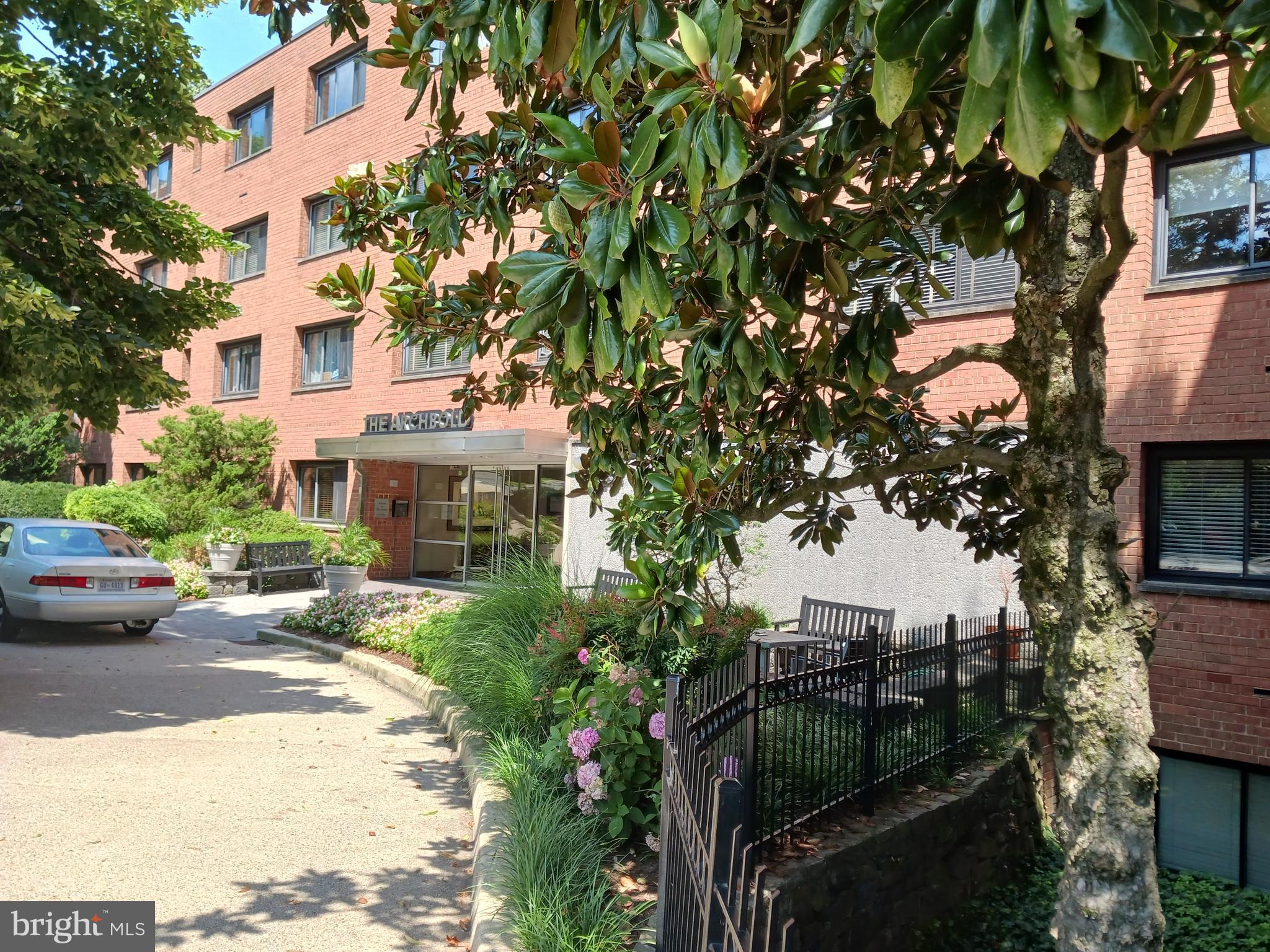 a view of multiple houses with yard