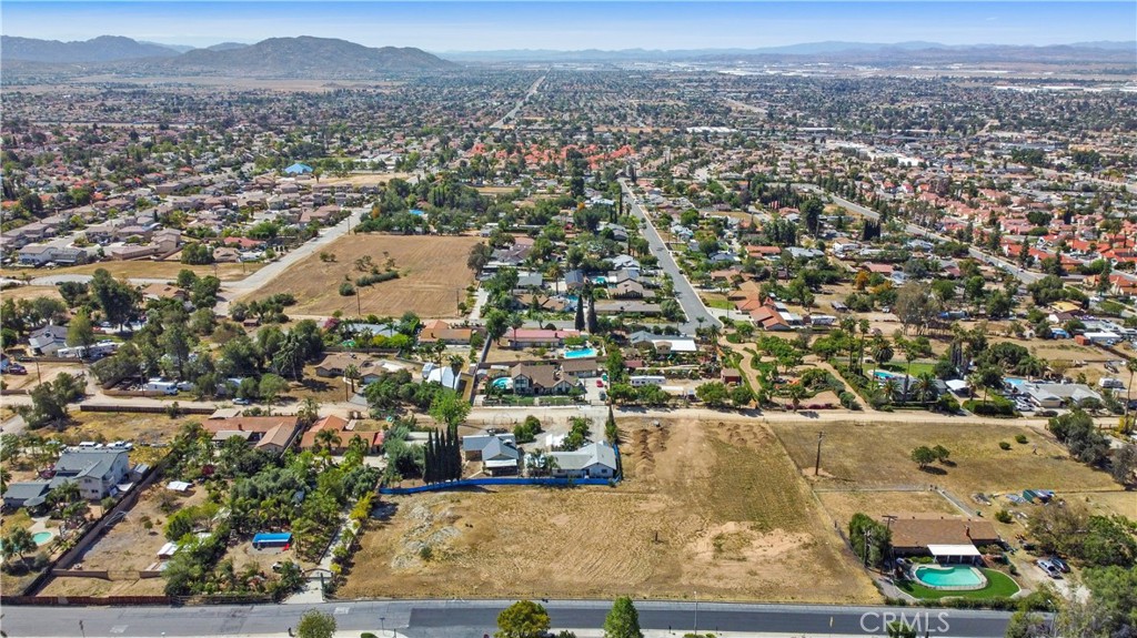 an aerial view of residential house and outdoor space