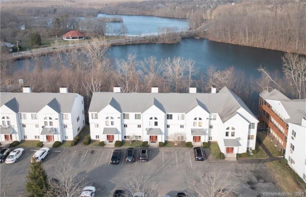 an aerial view of houses with outdoor space