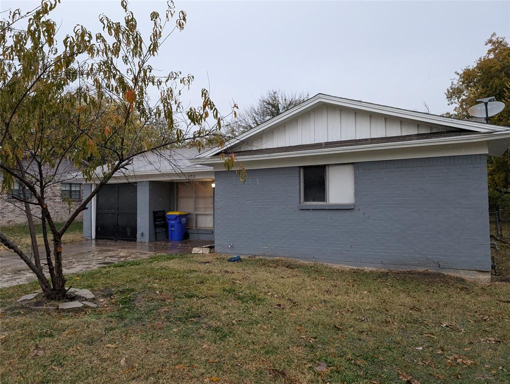 a front view of a house with yard