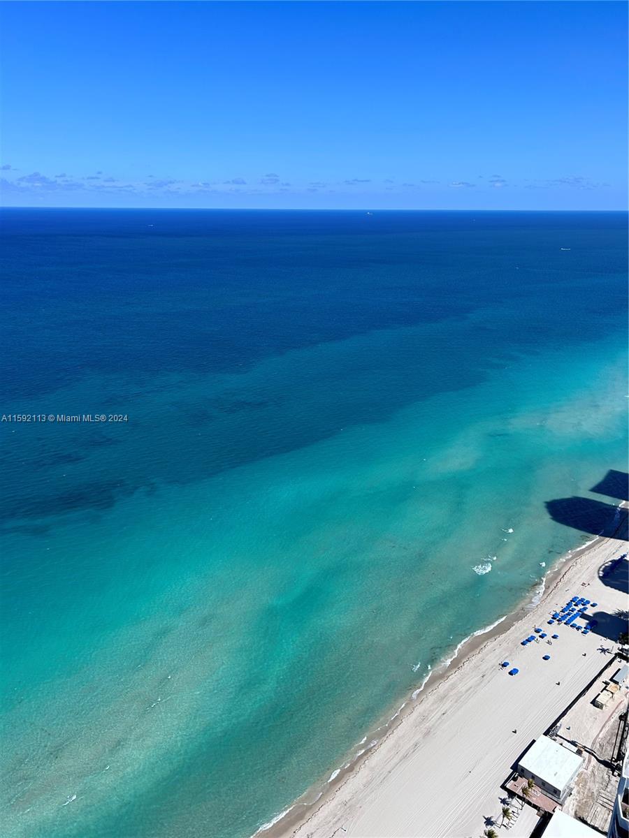 a view of an ocean from a balcony