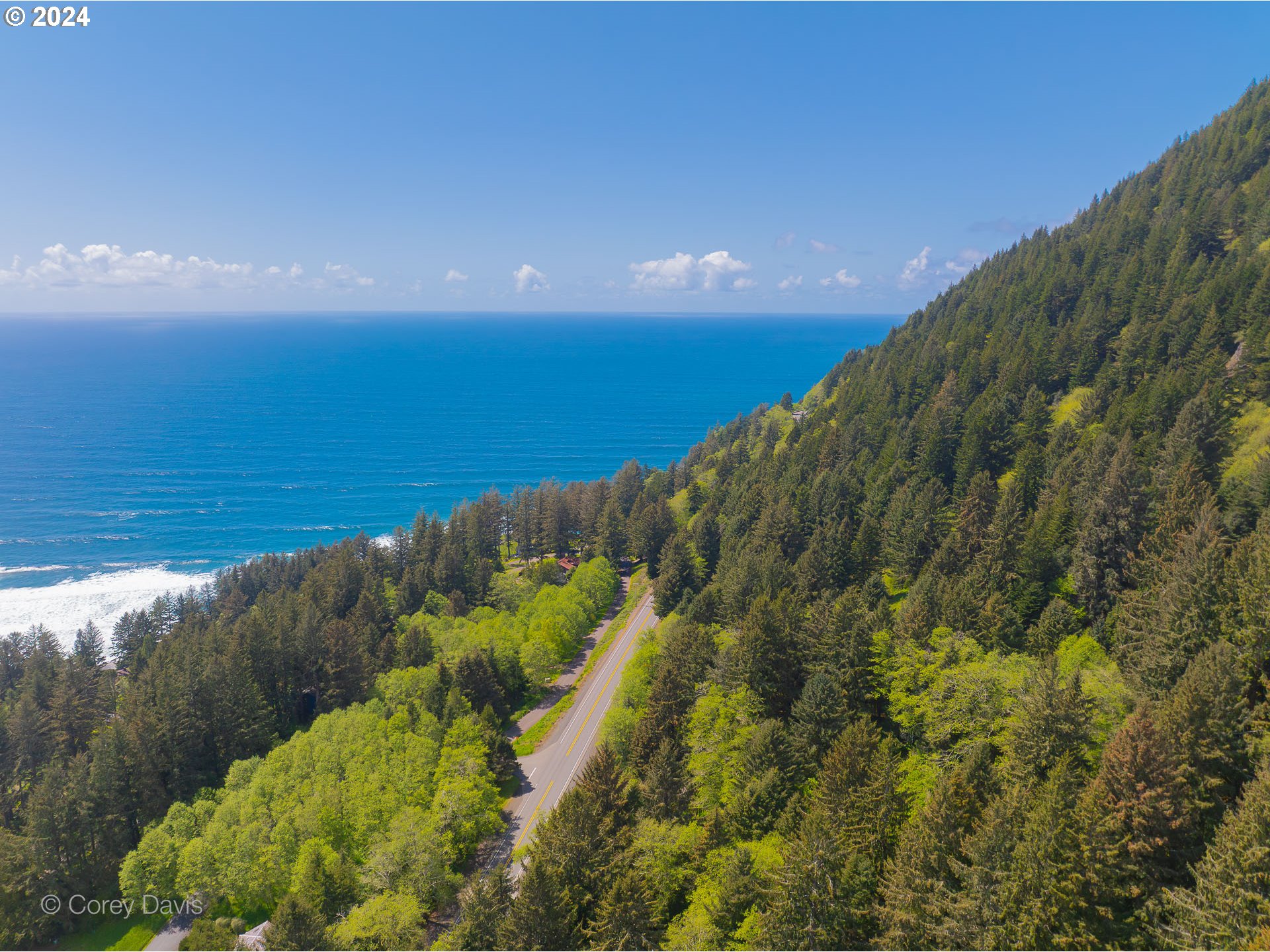 a view of an ocean and a mountain