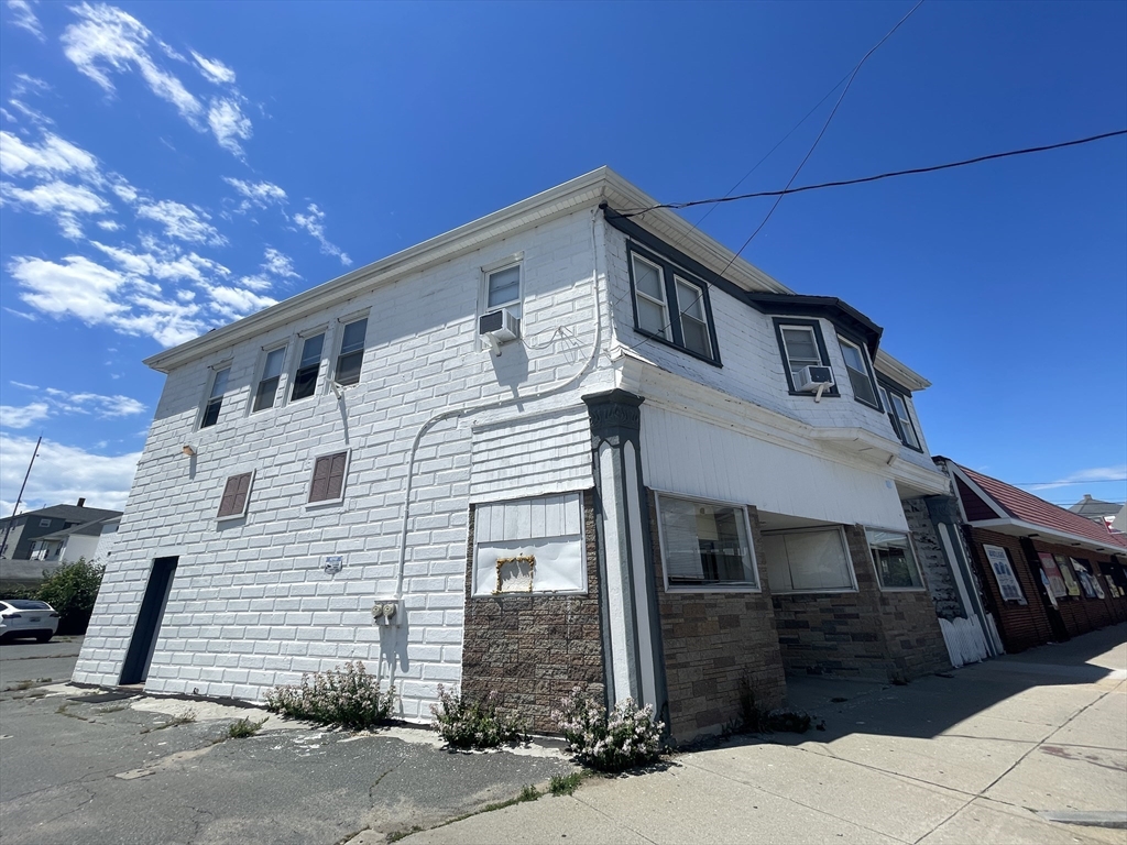 a view of a house with a street