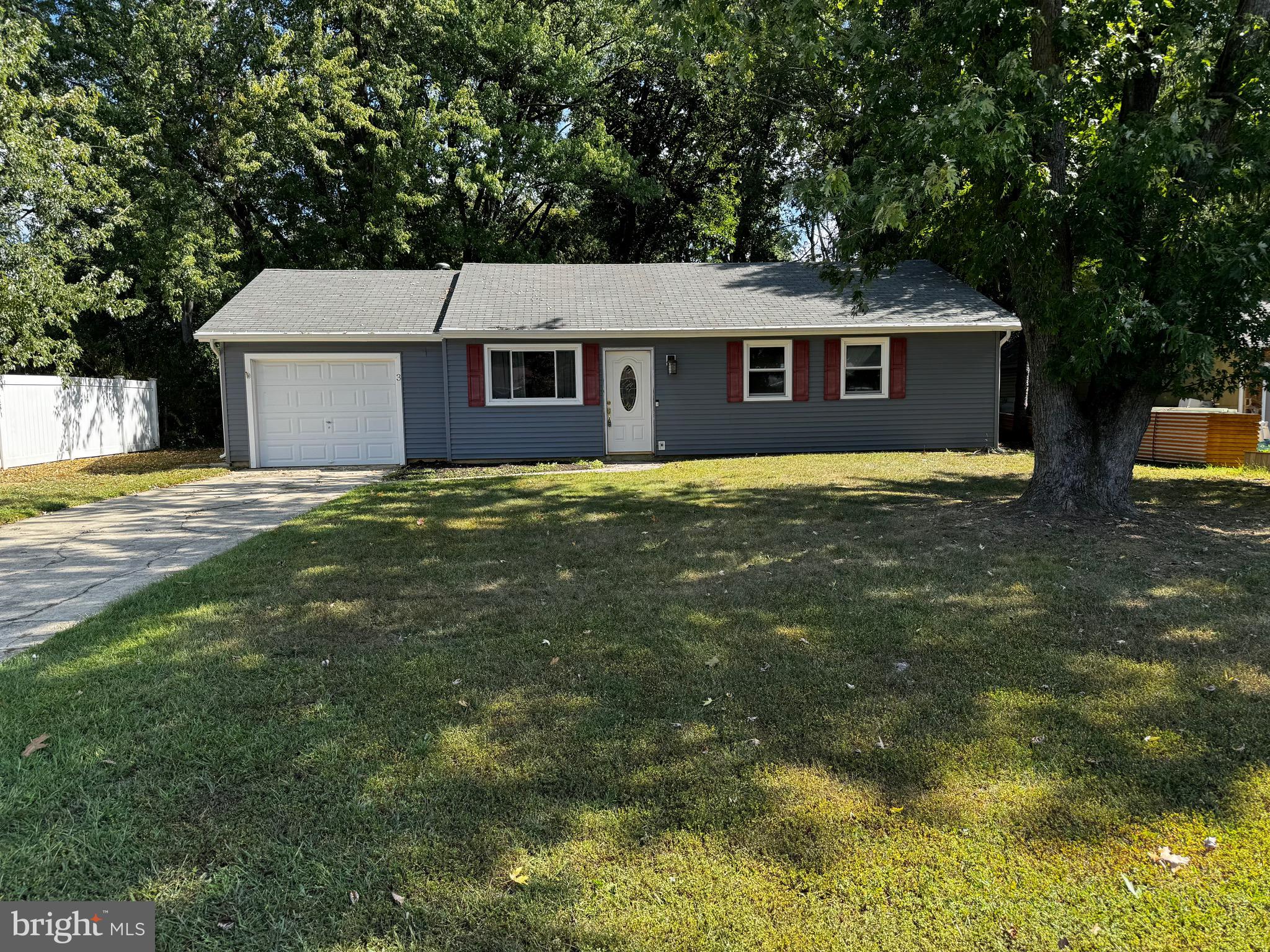 a front view of a house with yard