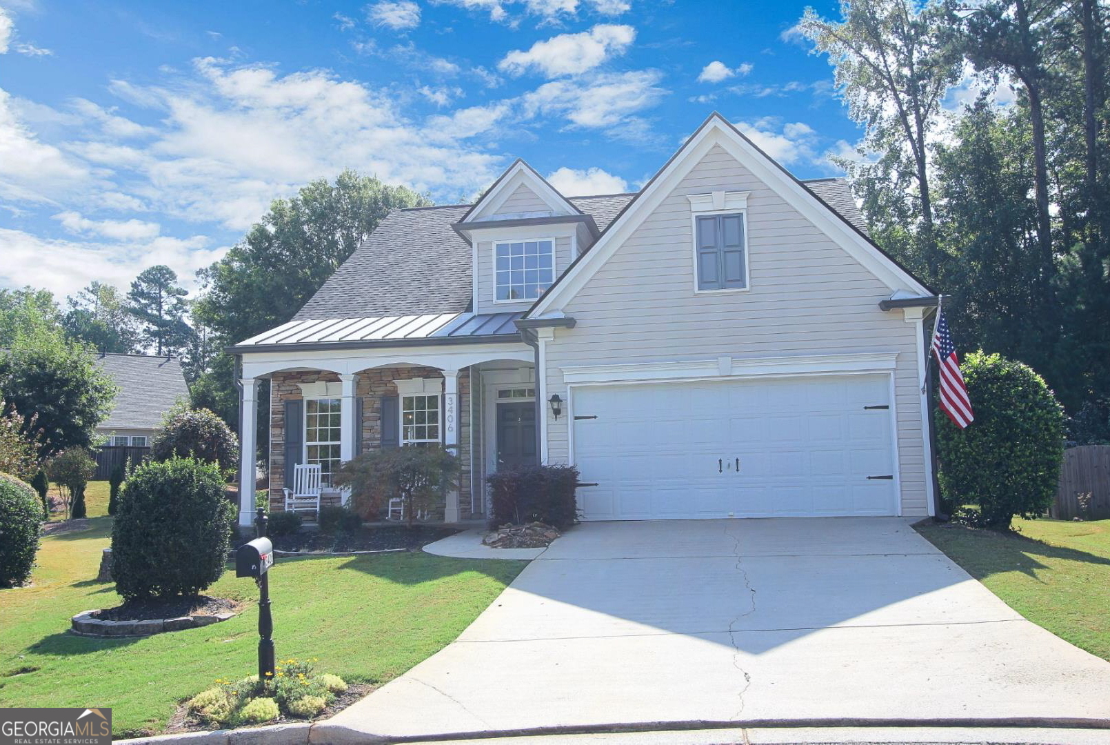 a view of a yard in front view of a house