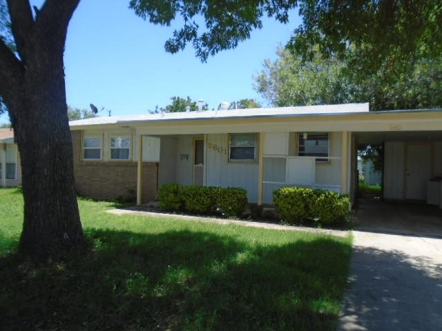 a view of house with front yard