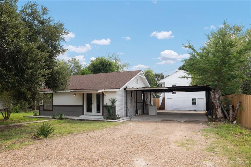 View of front of home featuring a carport