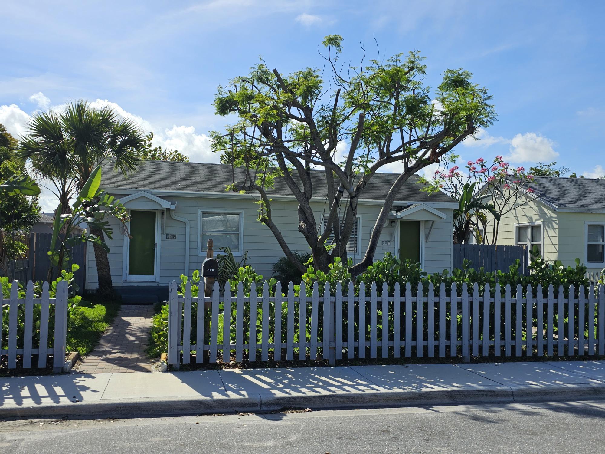 front view of a house with a small yard