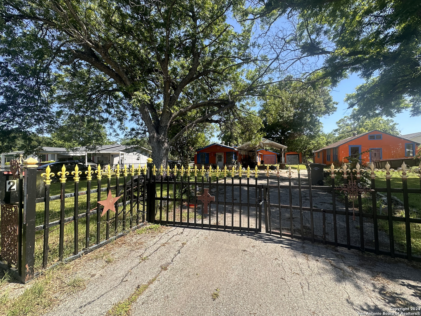 a view of a wrought iron fence