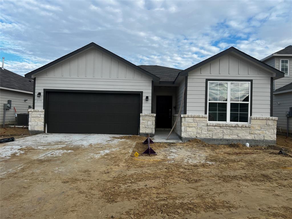 a house with yard in front of it