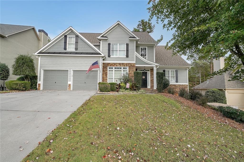 front view of a house with a yard