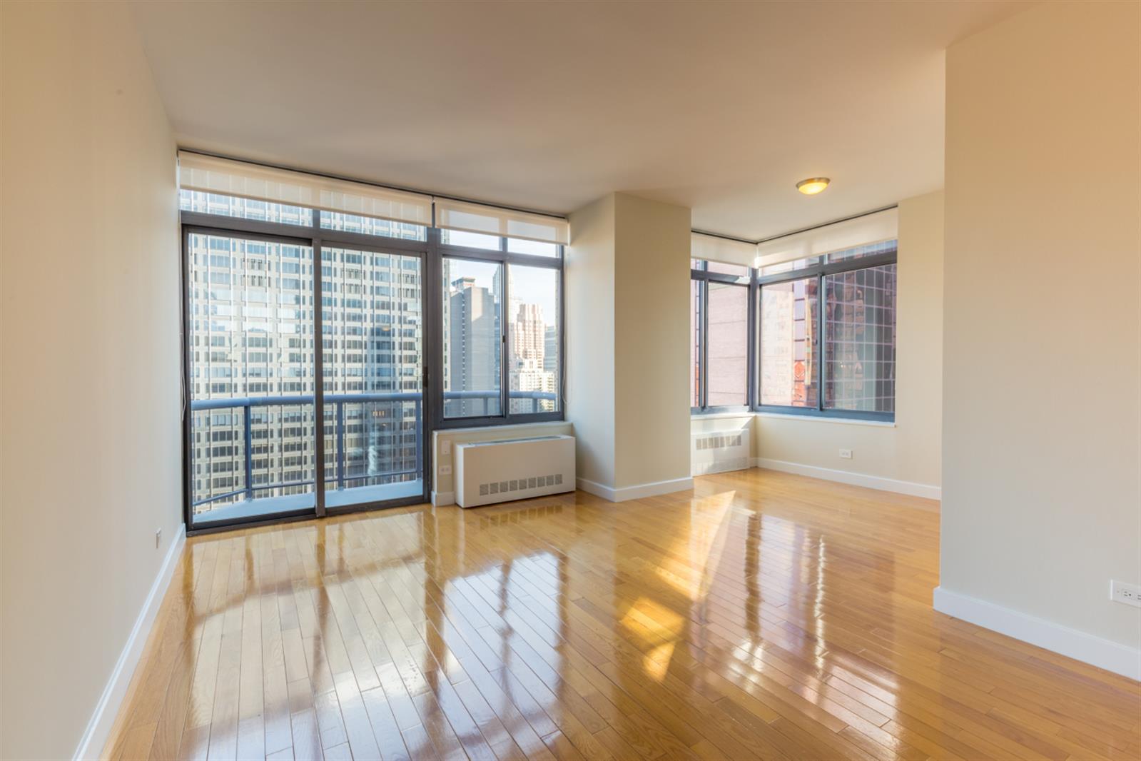 a view of an empty room with glass door