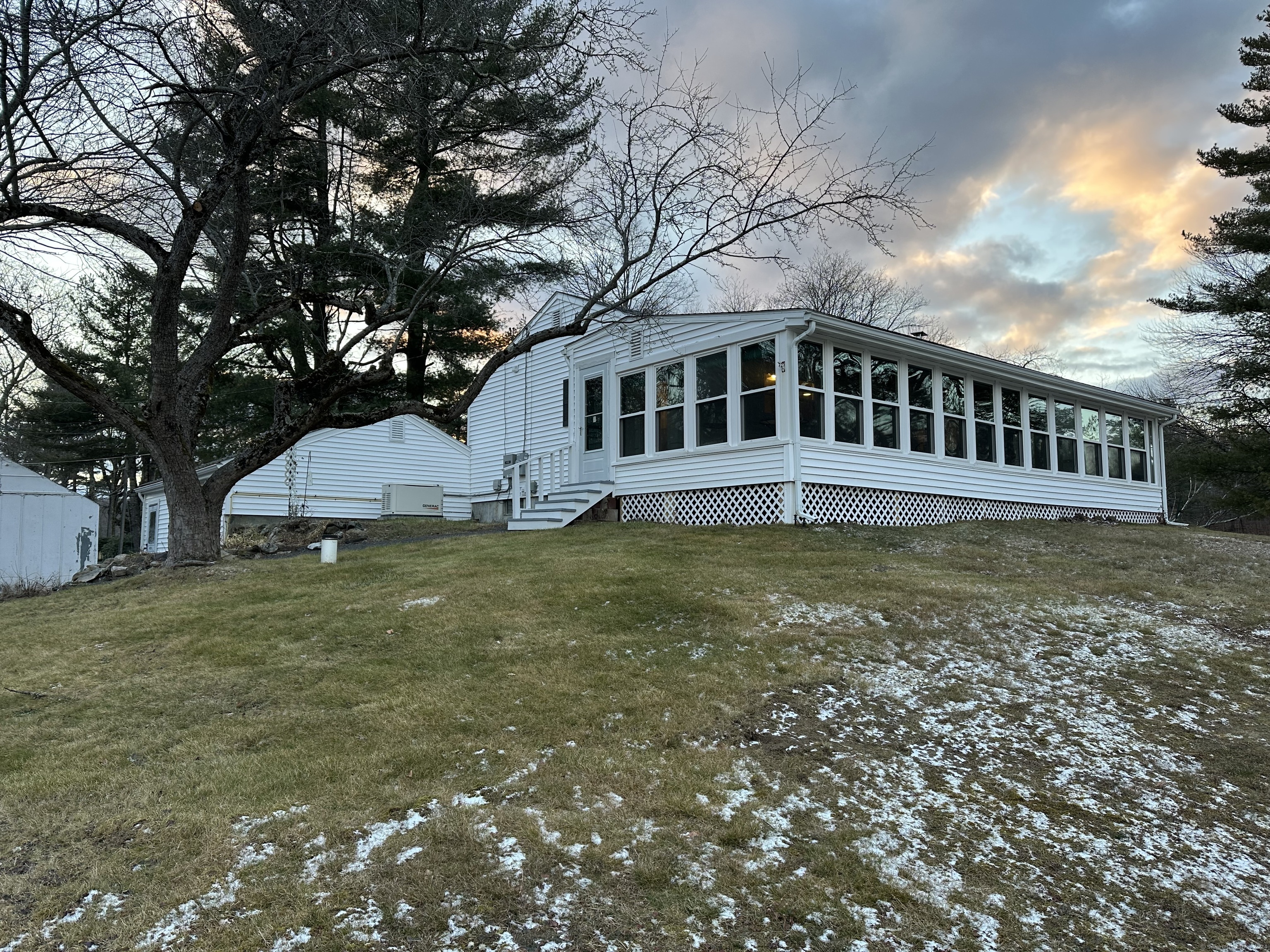 a view of a house with a yard