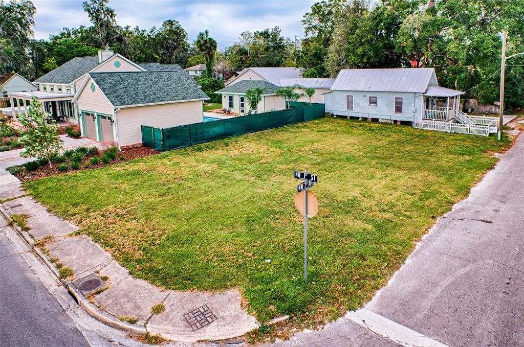 a front view of house with yard and trees