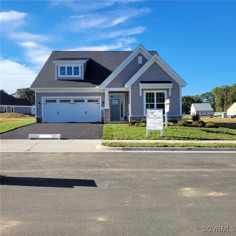 front view of a house with a small yard