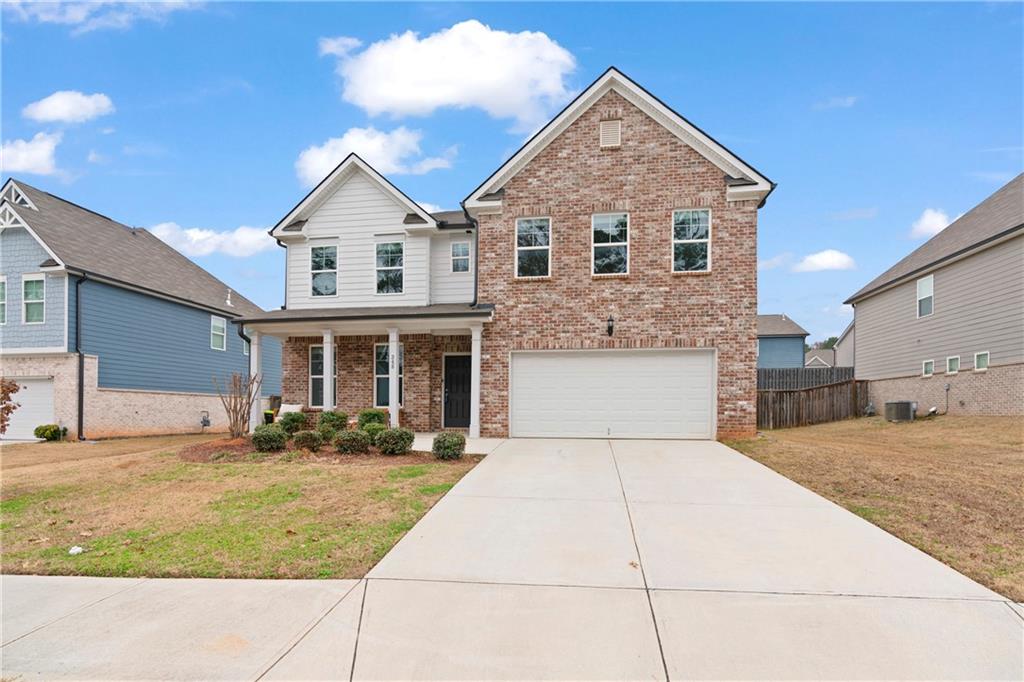 a view of house and outdoor space with yard