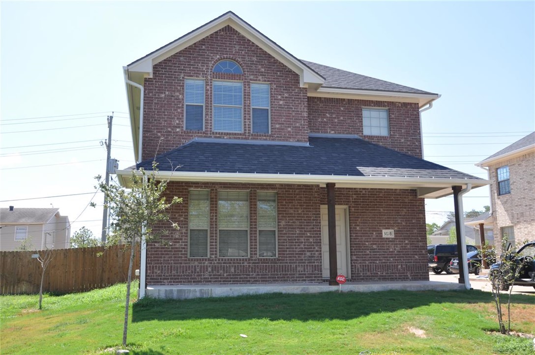 View of front property featuring a porch and a fro