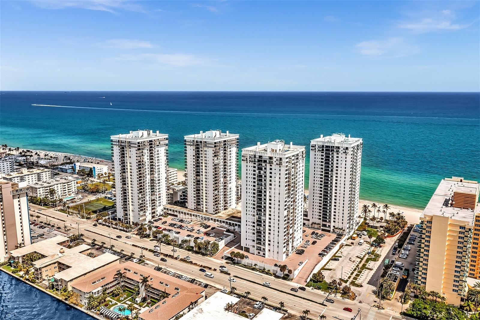 a view of city with ocean