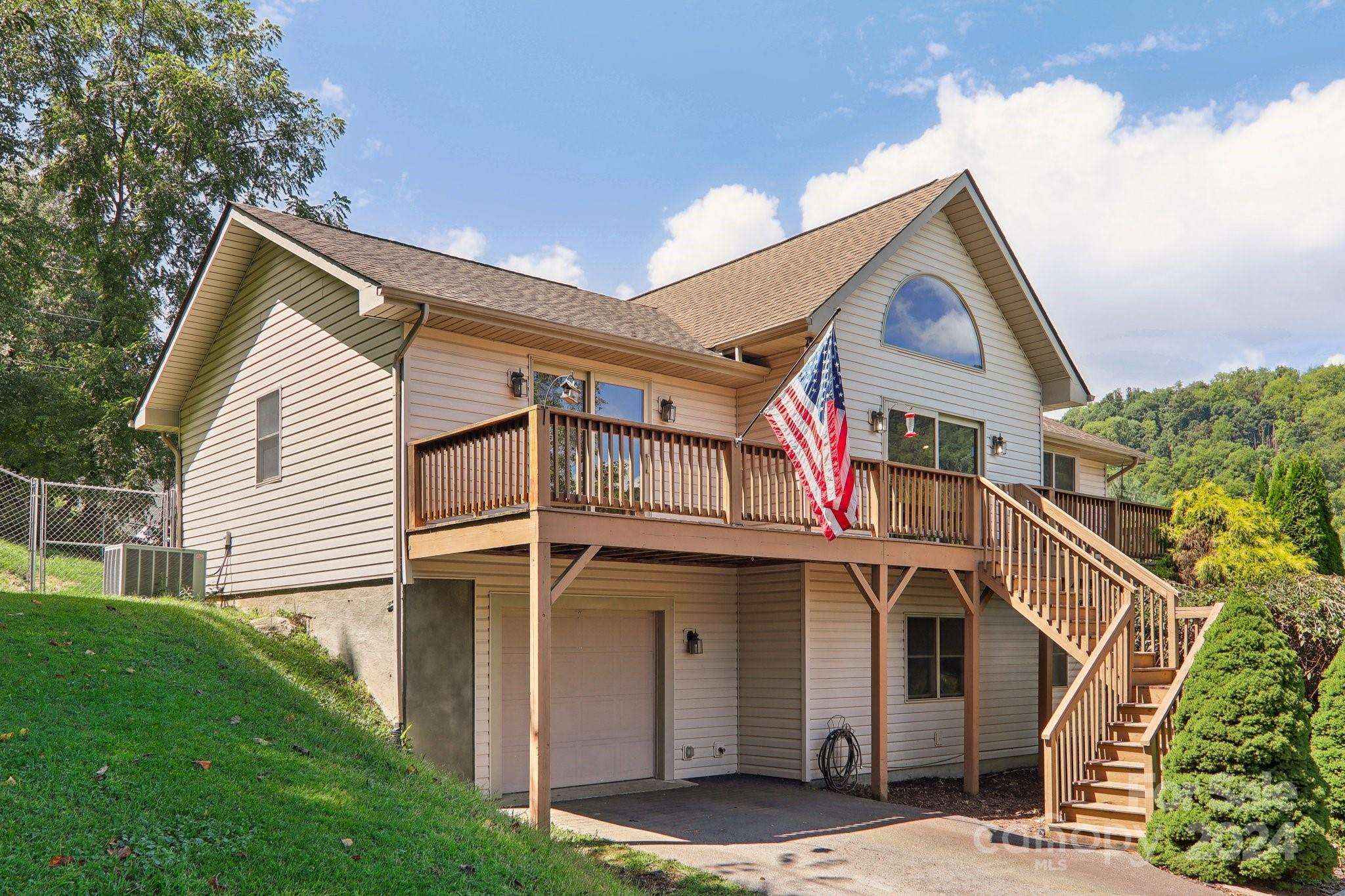 a view of front of house with a yard