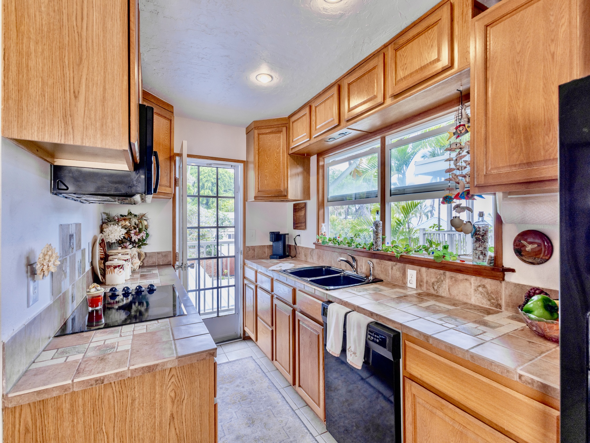 a kitchen that has a lot of cabinets in it