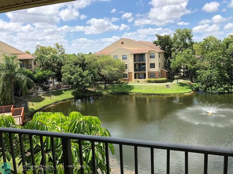 a view of lake from a balcony