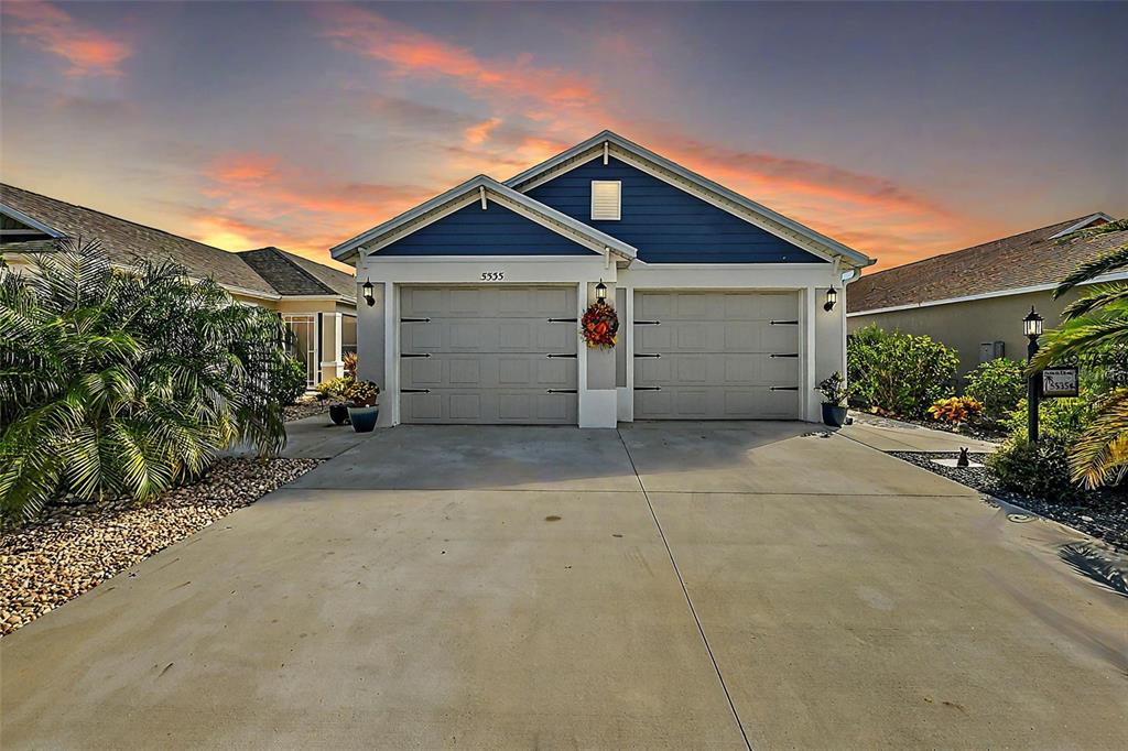 a view of garage and yard