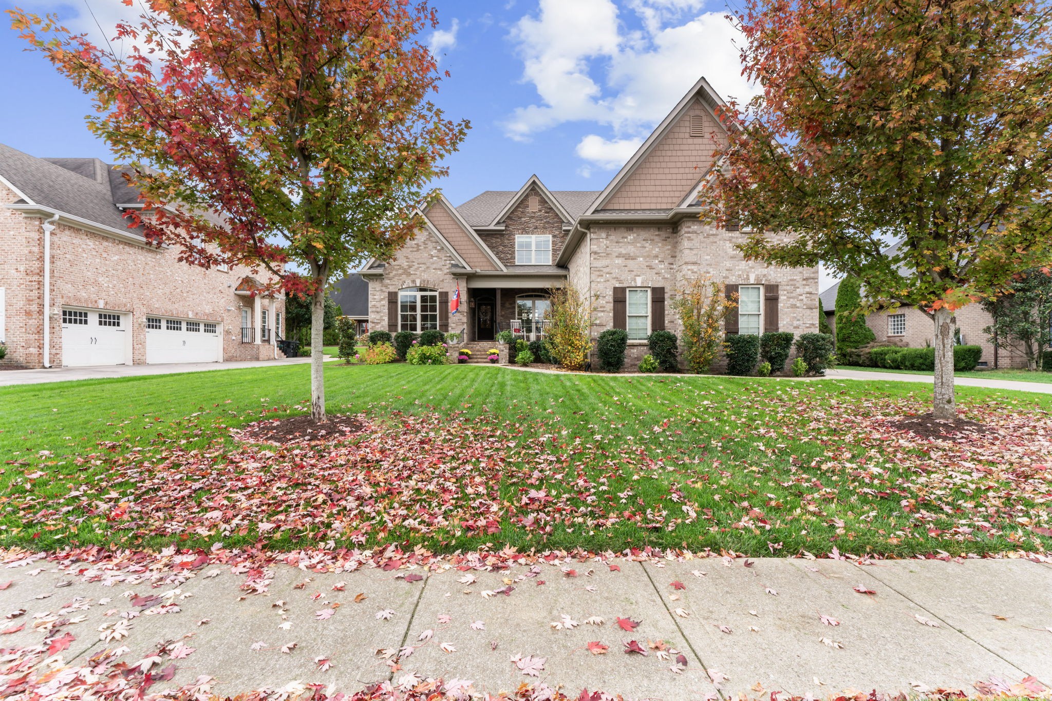 front view of a house with a yard