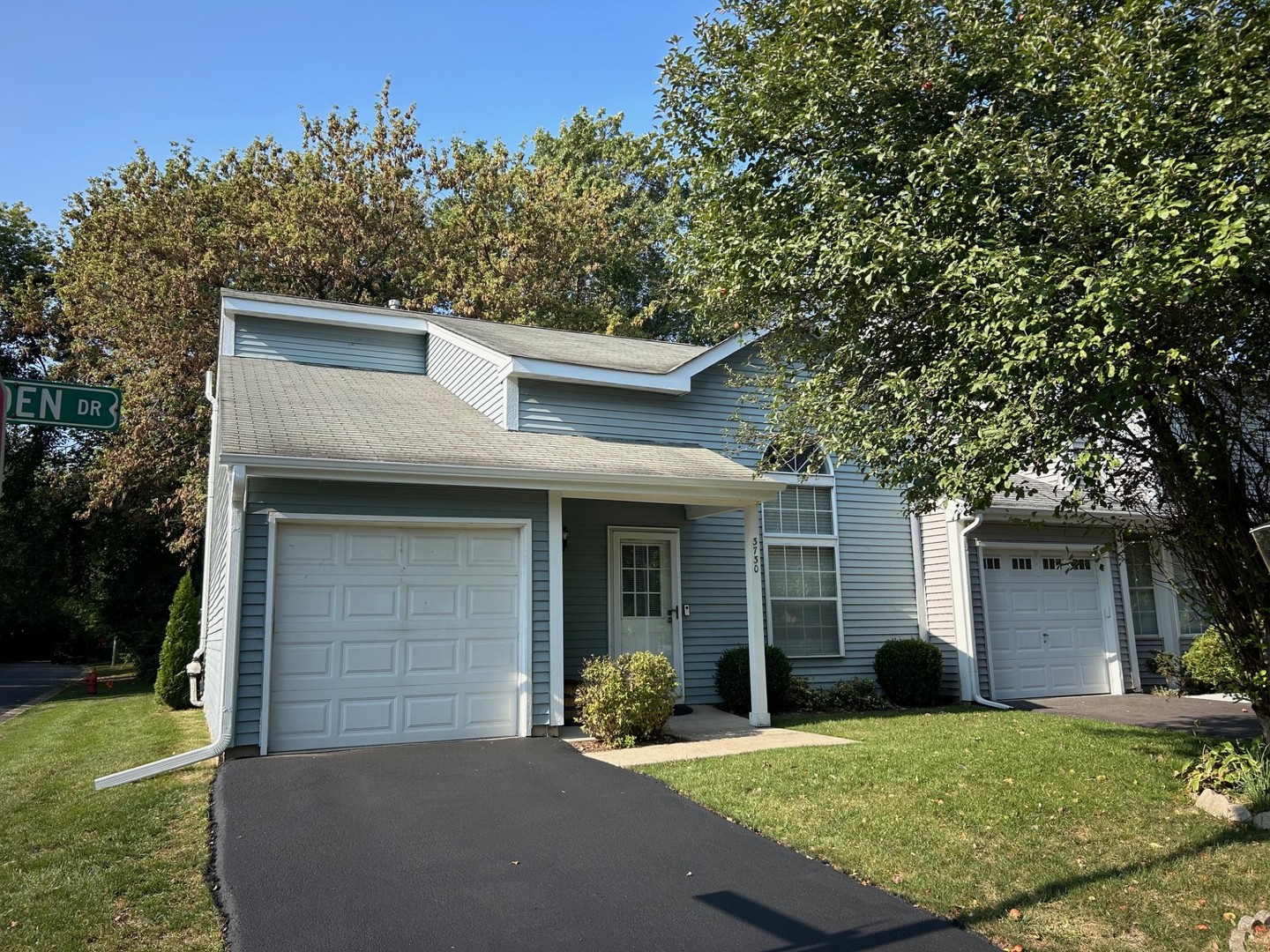 front view of a house with a patio