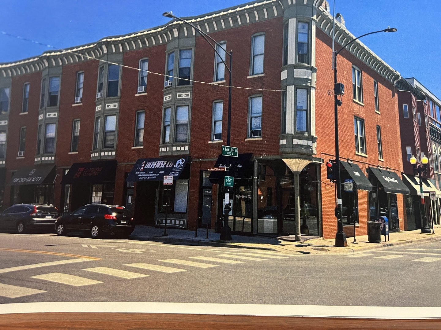 a front view of a building and a street