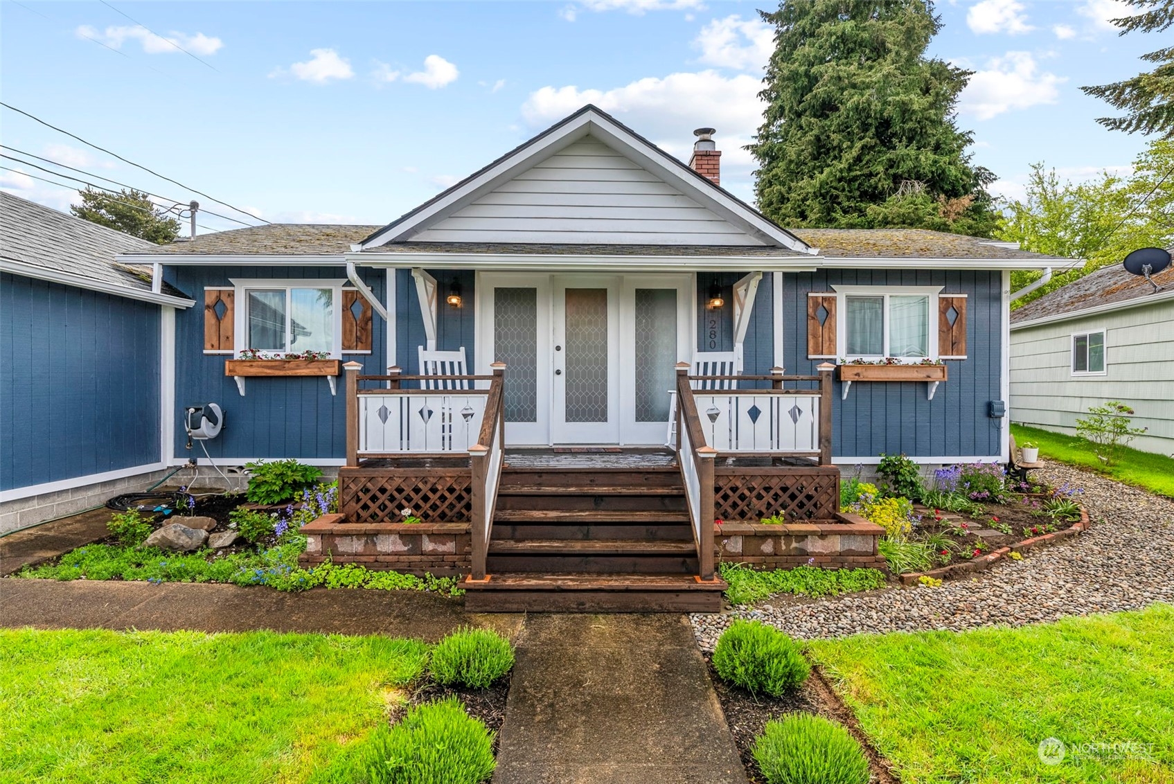 front view of a house with a yard